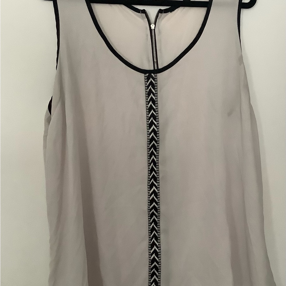 White with black trim polyester tank. Size 2X.